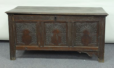 Lot 303 - An 18th Century oak coffer, the hinged lid...