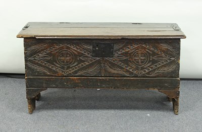 Lot 304 - A 17th Century oak chest with carved front,...