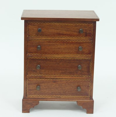 Lot 313 - An Edwardian mahogany apprentice chest, fitted...