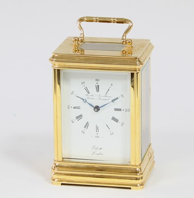 Lot 323 - A brass cased carriage clock by F W Elliott &...