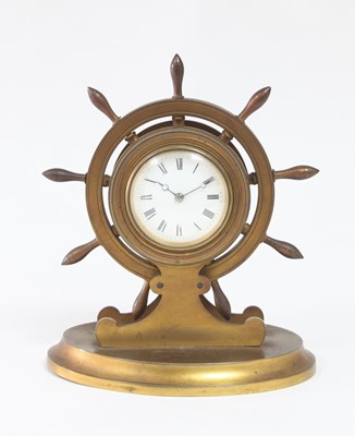 Lot 337 - A late Victorian gilt brass mantel clock,...