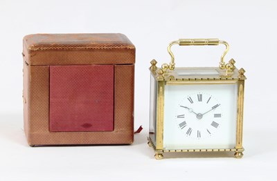 Lot 349 - A gilt brass cased carriage clock, the white...