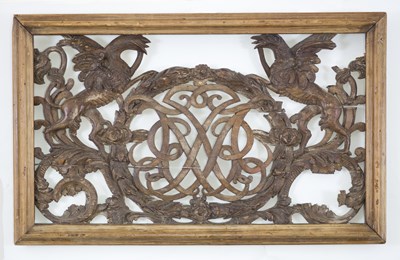 Lot 371 - A fine carved and pierced lime wood panel,...