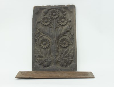 Lot 380 - A 17th Century oak panel carved with flowers,...