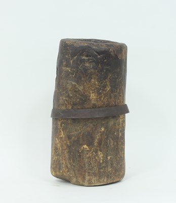 Lot 389 - A wooden iron bound mortar of tall cylindrical...