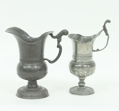 Lot 390 - An 18th Century pewter jug of Baroque style...