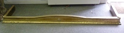 Lot 396 - A large 19th Century brass fender, 199cm wide