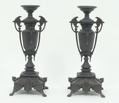 Lot 400 - A pair of late Victorian spelter vases, of two-...