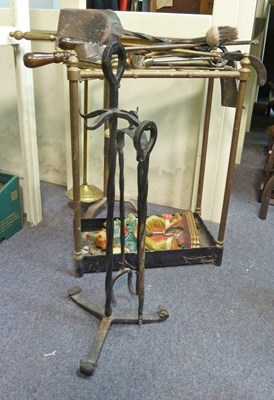 Lot 404 - A brass six-division umbrella stand, 41cm wide,...