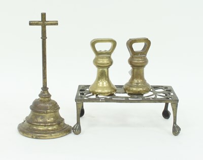 Lot 406 - Two brass pillar weights, a trivet and a door...