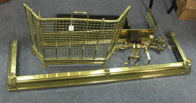 Lot 419 - A brass fire curb with pierced decoration,...