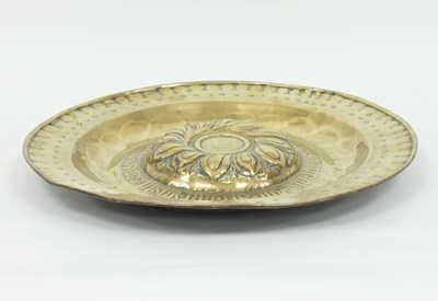 Lot 423 - An 18th Century brass alms dish, probably...