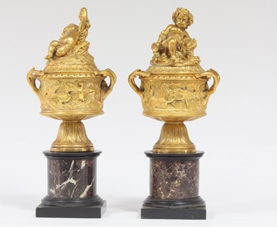 Lot 439 - A pair of gilt metal urns and covers, early...