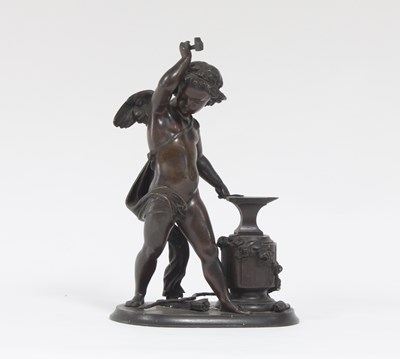 Lot 441 - A 19th Century bronze figure of Cupid at his...