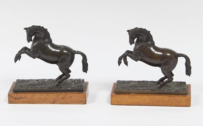 Lot 443 - A pair of bronze rearing horses on rectangular...