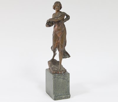 Lot 444 - A French Art Nouveau bronze figure of a girl...