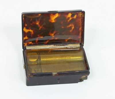 Lot 735 - A tortoiseshell cased music box, the cylinder...