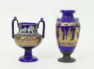 Lot 750 - Two 19th Century blue glass vases, decorated...