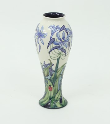 Lot 766 - A Moorcroft vase, blue flowers and ladybirds,...