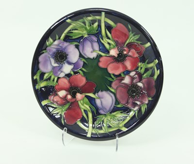 Lot 768 - A Moorcroft plate, Anemones, 2002, initialled,...