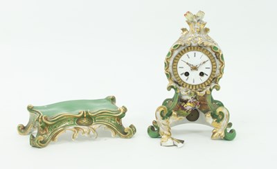 Lot 779 - A French porcelain clock case, mid 19th...