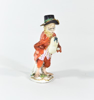 Lot 791 - A German porcelain monkey band figure, 18th...