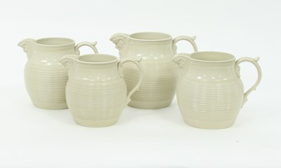 Lot 804 - A set of four Minton graduated jugs of cream...