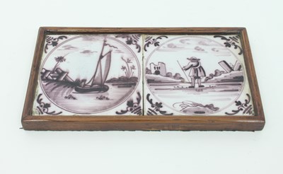 Lot 813 - A pair of Delft manganese tiles, framed together