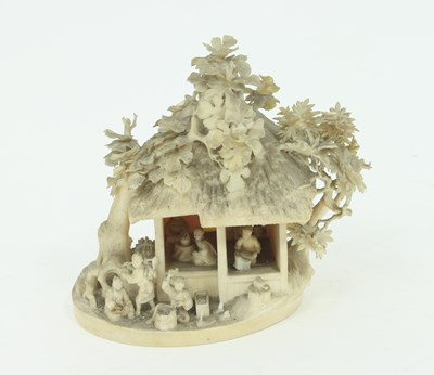 Lot 862 - A Japanese carved ivory house, Meiji period,...