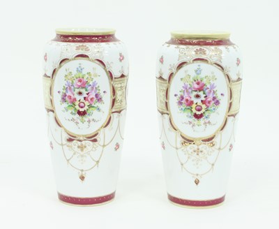 Lot 872 - A pair of Noritake baluster vases, decorated...