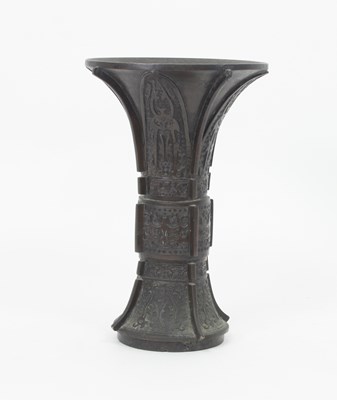 Lot 875 - A cast bronze Gu, the trumpet form neck with...