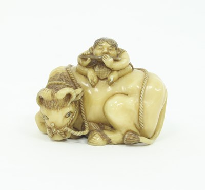 Lot 876 - A Japanese carved ivory netsuke signed...