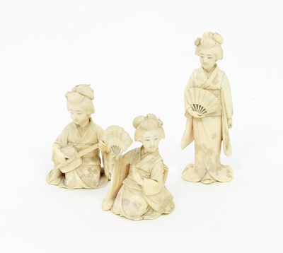 Lot 880 - Three carved ivory okimonos, Meiji period,...