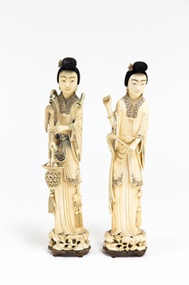 Lot 881 - A pair of 19th Century carved ivory figures of...