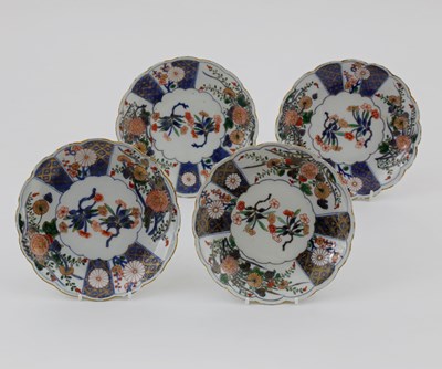 Lot 899 - Four Chinese Imari saucers, Kangxi, with...