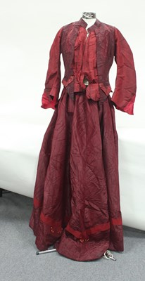 Lot 927 - A lady's red silk costume of jacket and skirt,...