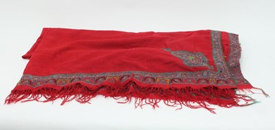 Lot 929 - A large Kashmiri shawl of bright scarlet wool...