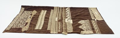 Lot 931 - A lace sample banner of various lace samples...