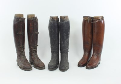 Lot 953 - Seven pairs of riding boots, with wooden trees,...