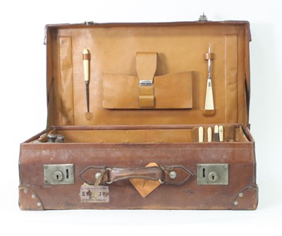 Lot 1017 - A gentleman's dressing case, part fitted with...