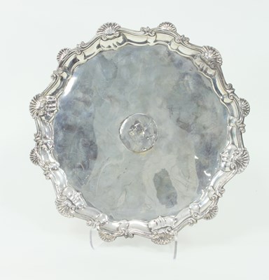 Lot 1022 - A George II silver salver, Ebenezer Coker,...