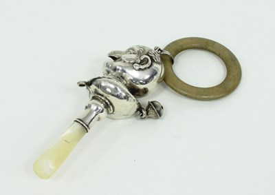 Lot 1055 - A child's silver rattle modelled as Mr Punch,...