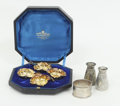 Lot 1069 - A set of four silver and silver-gilt open...