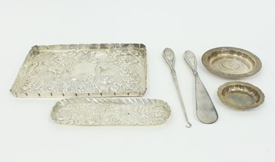 Lot 1071 - An embossed silver tray, London 1895, a pen...