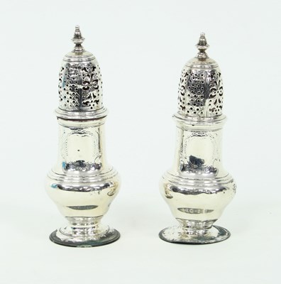 Lot 1113 - A pair of George II silver casters, London...