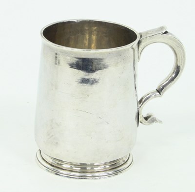 Lot 1114 - A George I silver baluster mug, maker's mark...