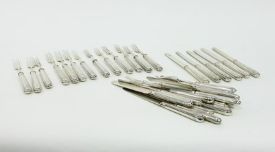 Lot 1116 - A matched set of eighteen dessert knives and...