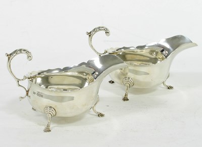 Lot 1131 - A pair of silver sauce boats, Mappin & Webb,...