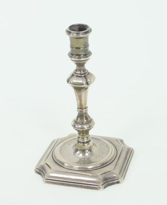 Lot 1135 - A George II silver taper stick, possibly...