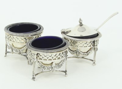 Lot 1142 - A three-piece silver cruet set, W & FR...